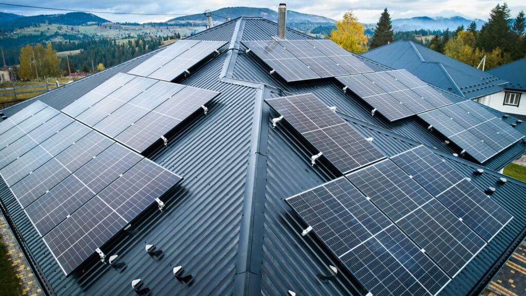 Solar panels installed on a sloped roof, showcasing the best orientation for solar panels to maximize energy efficiency.