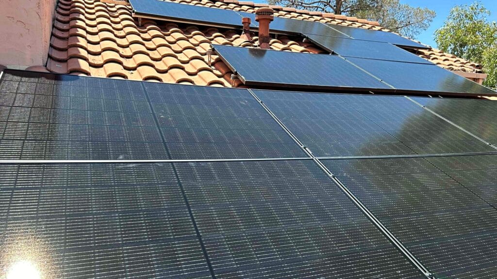 Solar panels with protective netting, showcasing silicon solar cells designed for efficient energy conversion.
