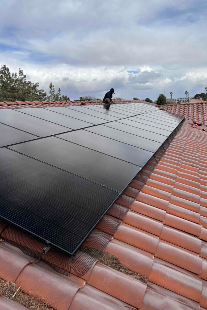 Bob's Repair solar technician installing panels on a Las Vegas residential rooftop